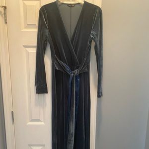 Turquoise/teal jump suite.